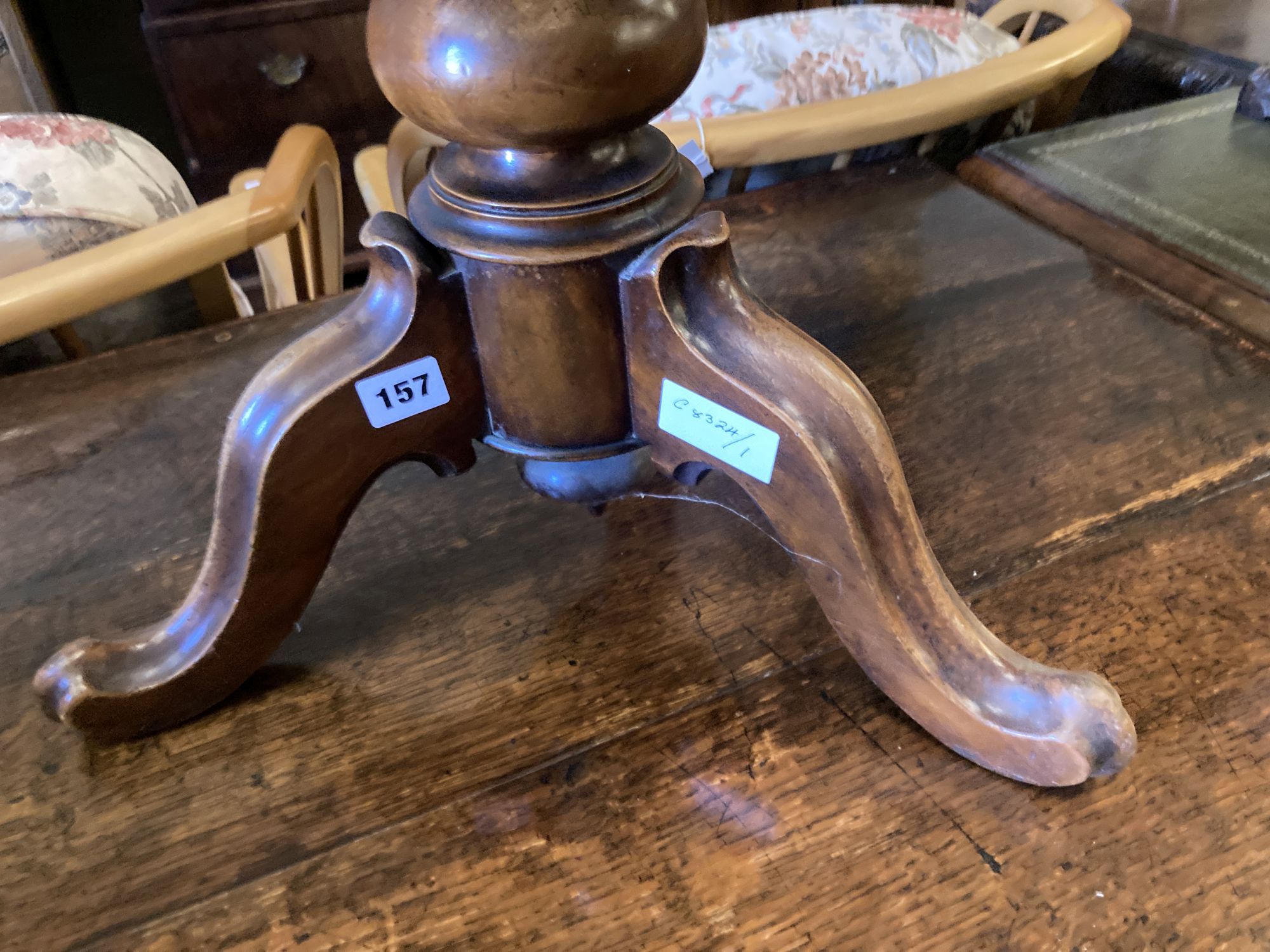 A Victorian revolving mahogany adjustable piano stool